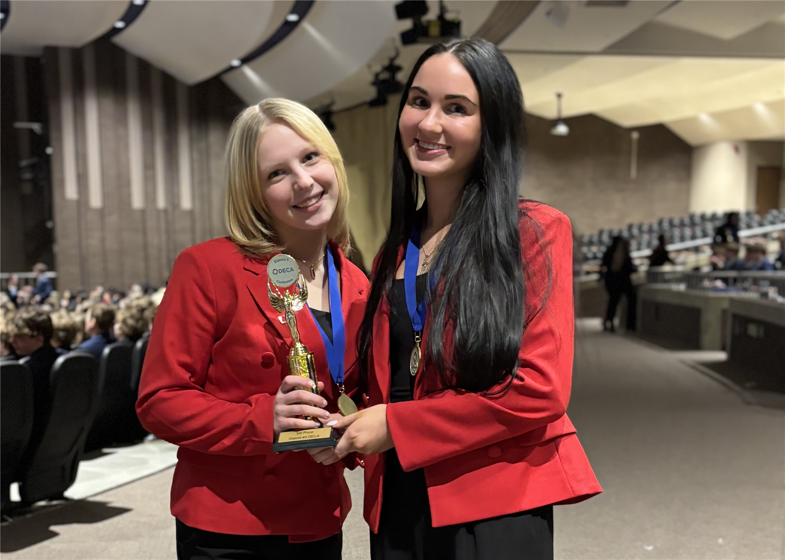  Westonka DECA students pose with trophy